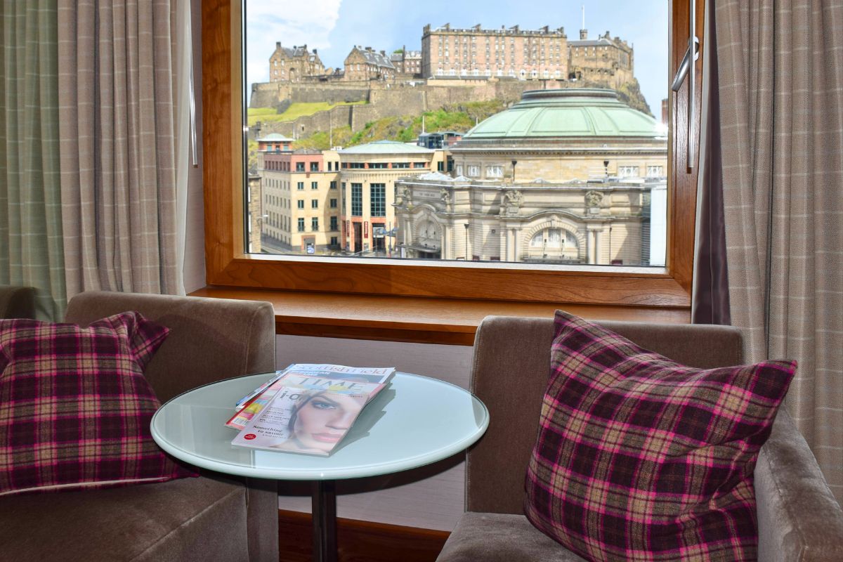 Edinburgh Castle view through the window of a hotel in Old Town