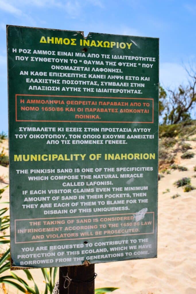 A sign warns visitors not to take the sand from Elafonisi Beach
