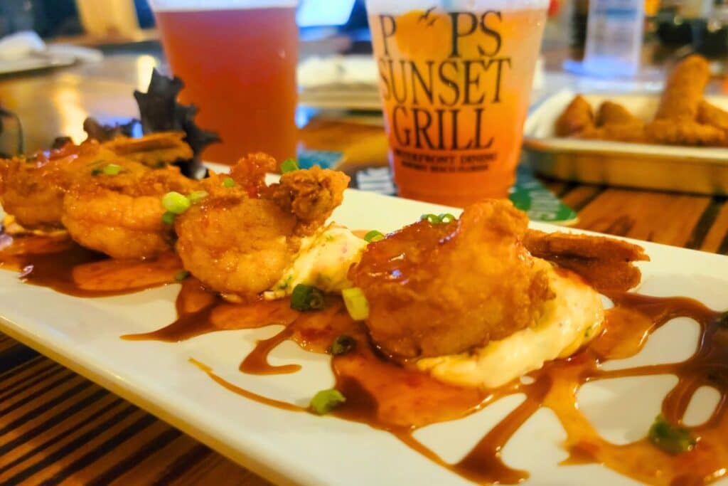 Fried shrimp and a tropical cocktail at Pop's