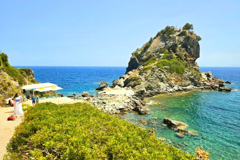 Chapel sitting atop a tall rocky outcrop on Skopelos