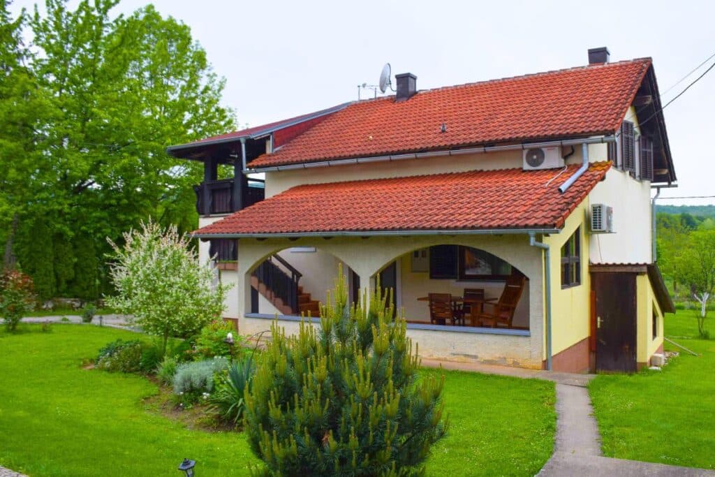 A charming country guesthouse in Croatia with a red tiled roof